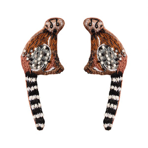 Brown, Black, White, and Grey Beaded and Embroidered Lemur Stud Earrings on White Background