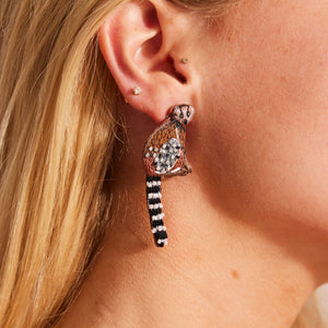 Brown, Black, White, and Grey Beaded and Embroidered Lemur Stud Earrings on Model's Ear