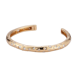 Gold and Crystal Cuff Bracelet on Flat White Background